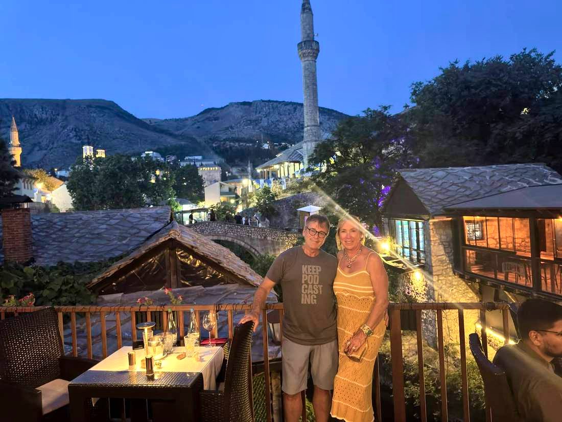 Our table on the terrace, blue hour coming down over the valley