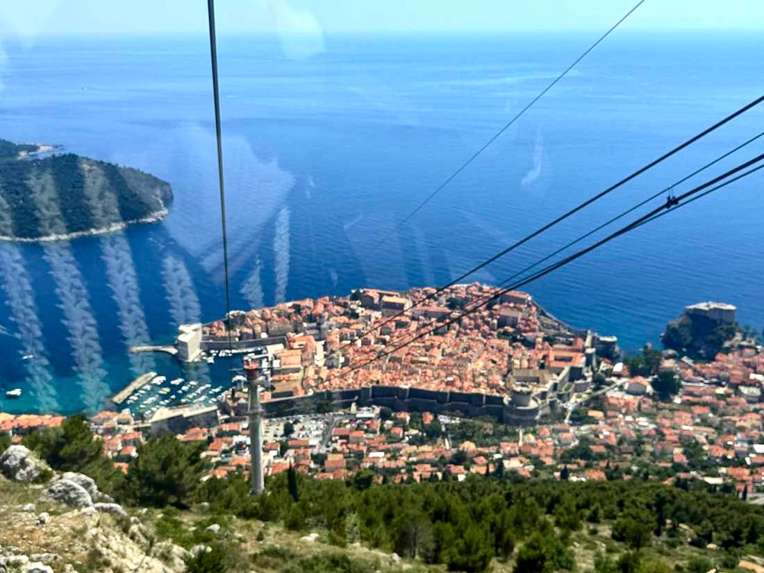 The whole city from the cable car, coming down off Srđ