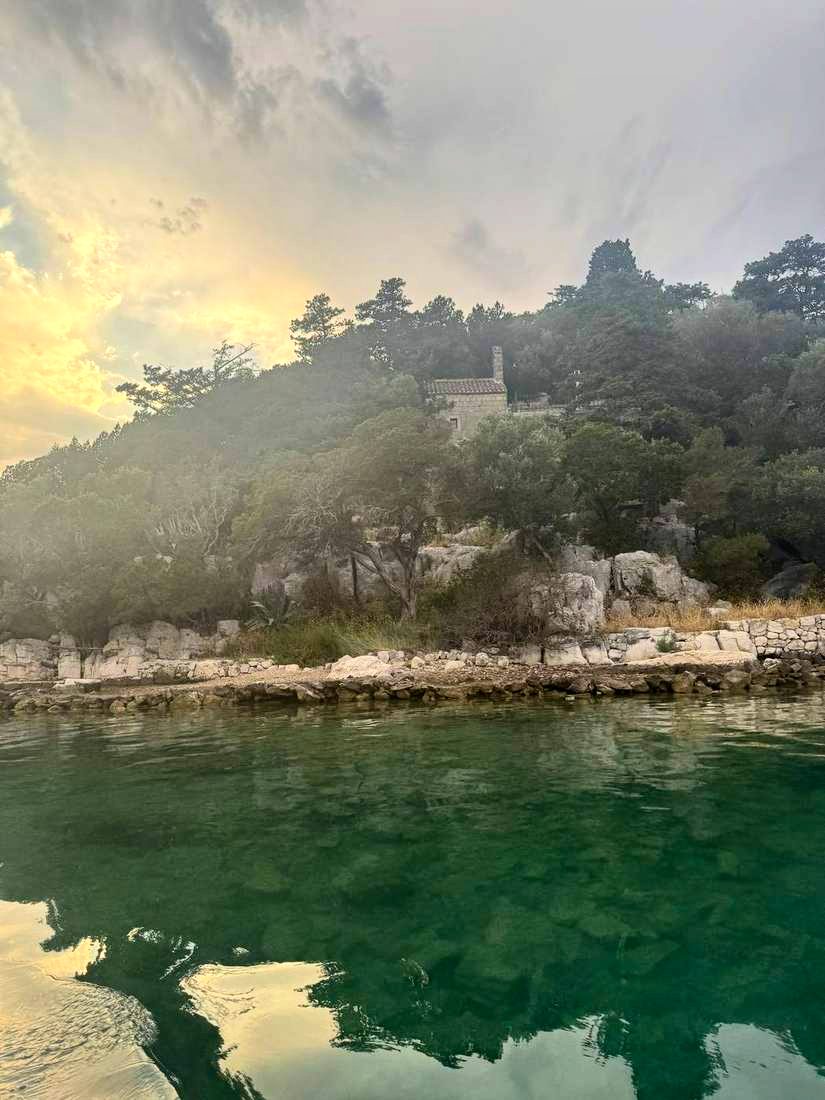 A cove to ourselves and one stone house on the hill